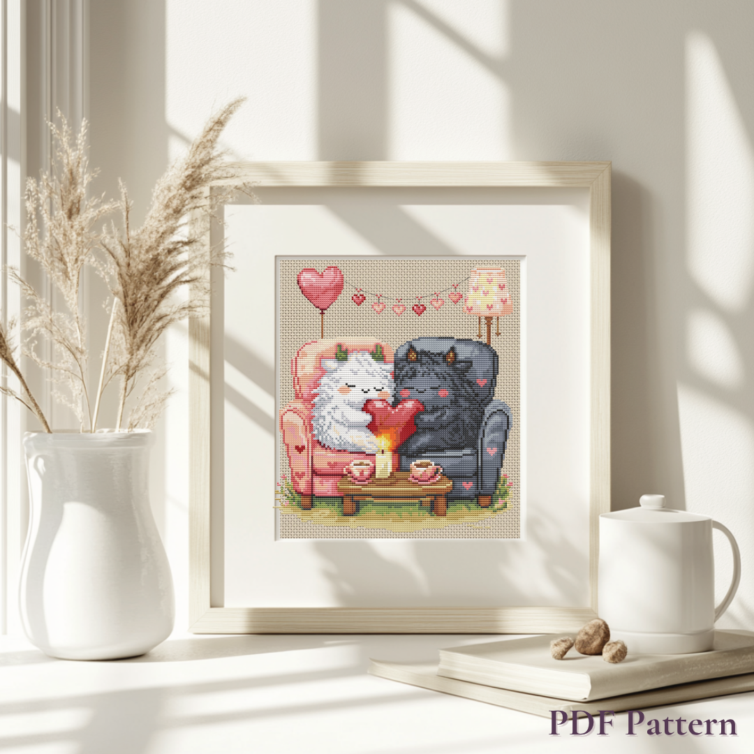Framed Romantic Beasties Love Duo cross stitch wall art displayed in a bright cottagecore interior with soft neutral decor