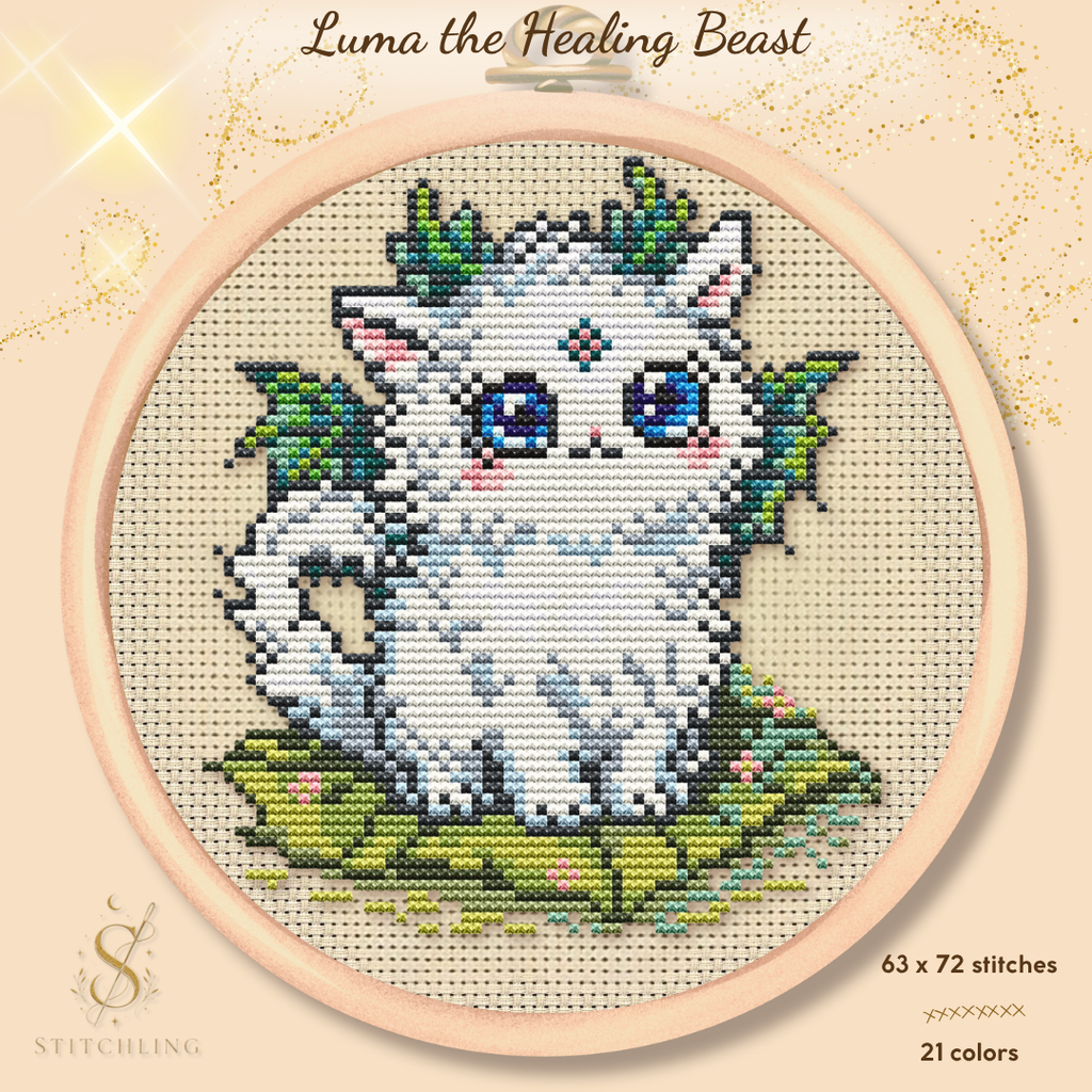 Luma the Healing Beast cross stitch pattern featuring a magical white fantasy fox with blue eyes, healing nature elements and woodland details, PDF counted cross stitch chart for embroidery lovers